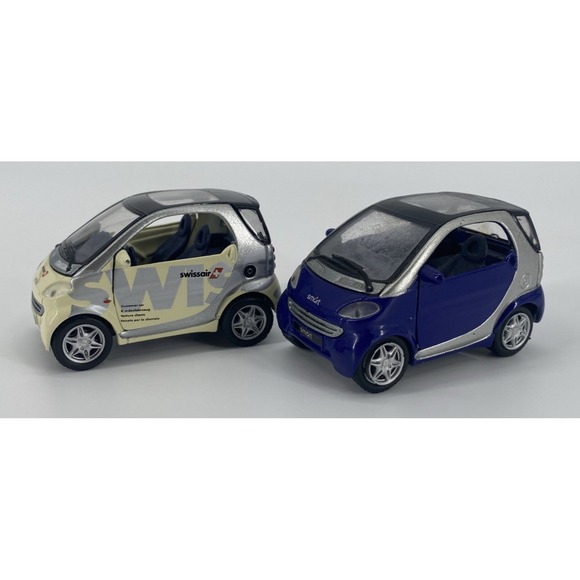 maisto Other - Maisto Smart City Coupe Scale 1/33 Cars Lot Of (2) - 1 Swissair and 1 Blue